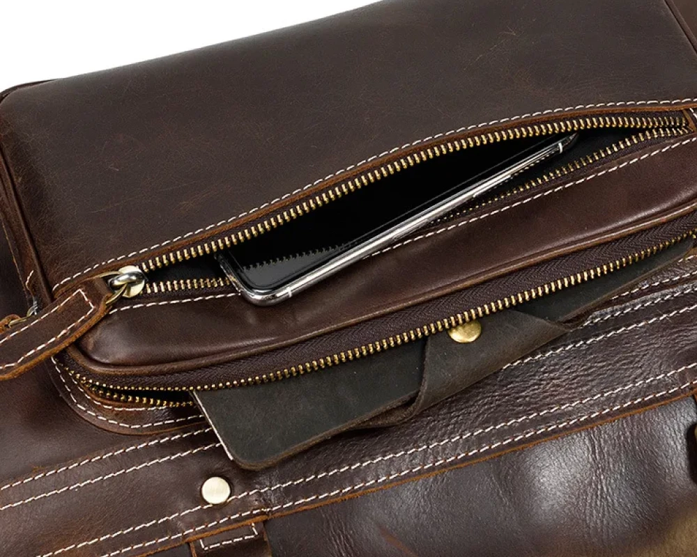 leather carry on bag wheels