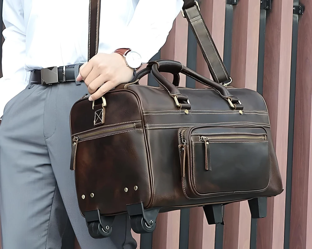 leather carry on bag wheels
